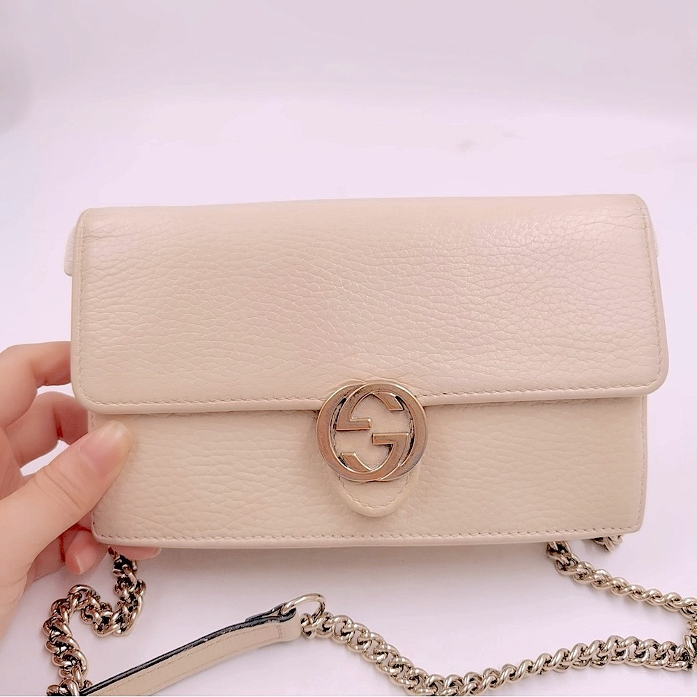 Authentic Gucci cream white interlocking GG woc on chain
